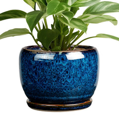 Round blue glazed planter