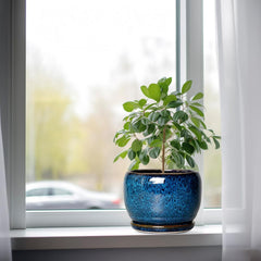 Round blue glazed planter